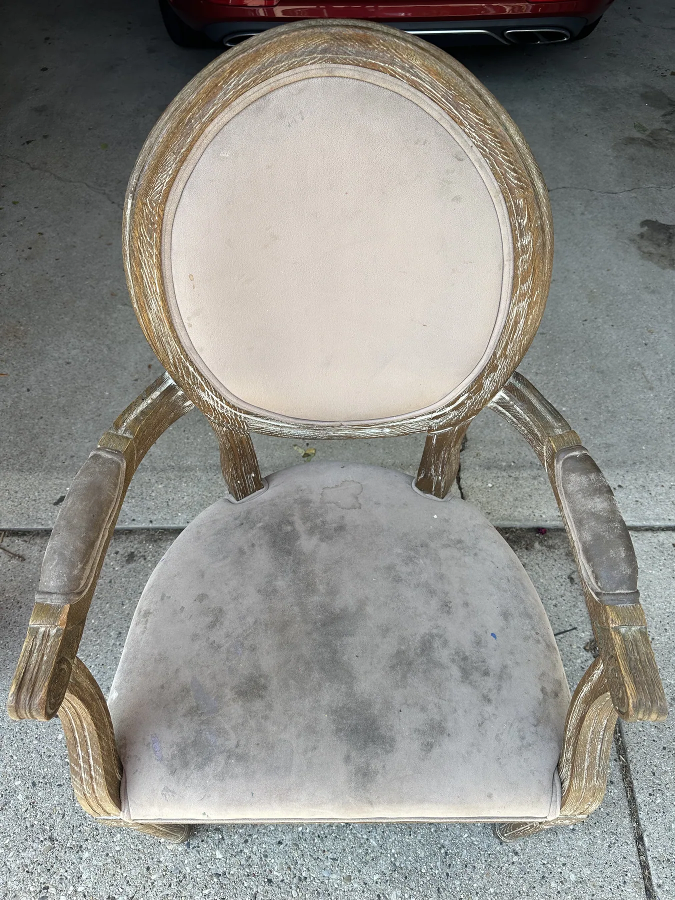 Armchair seat with ground in dirt before liquid dry cleaning