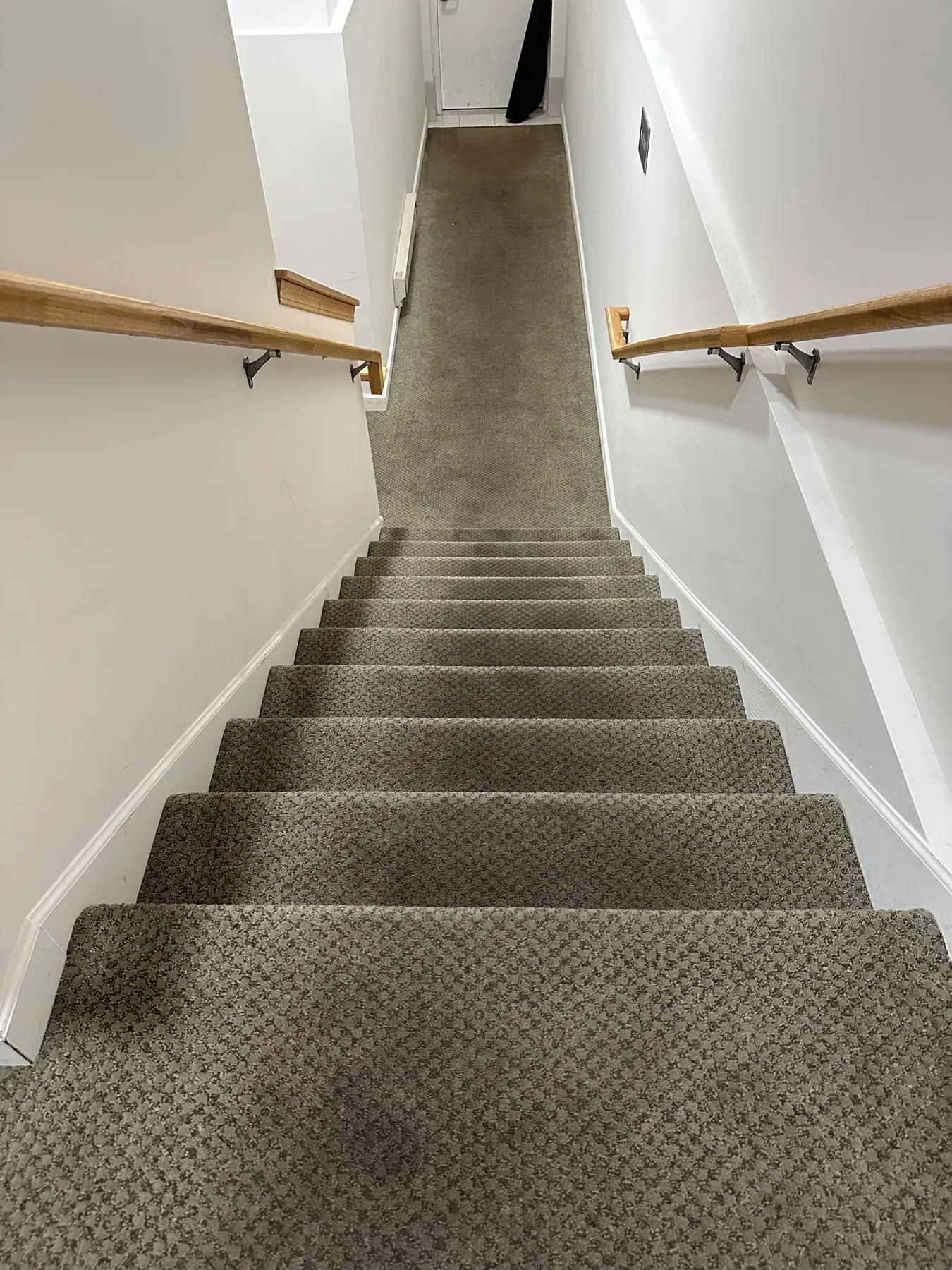 Residential staircase and landing carpet after liquid dry cleaning