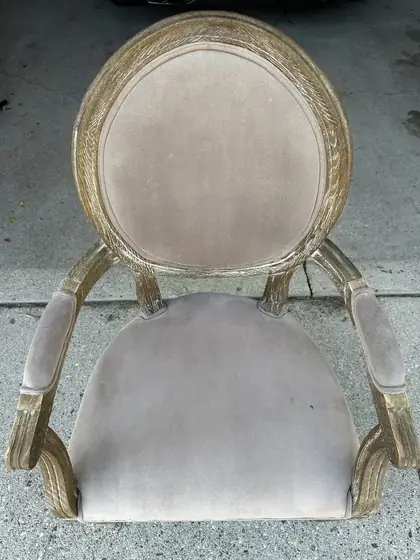 The same armchair seat clean and even with the velvet nap intact